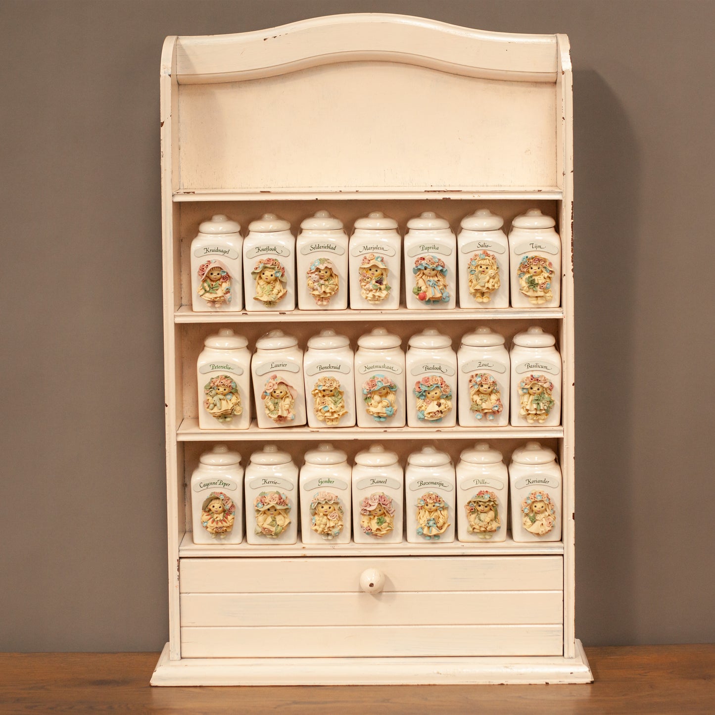 Spice rack with 21 handmade Tjitske van Nus ceramic jars