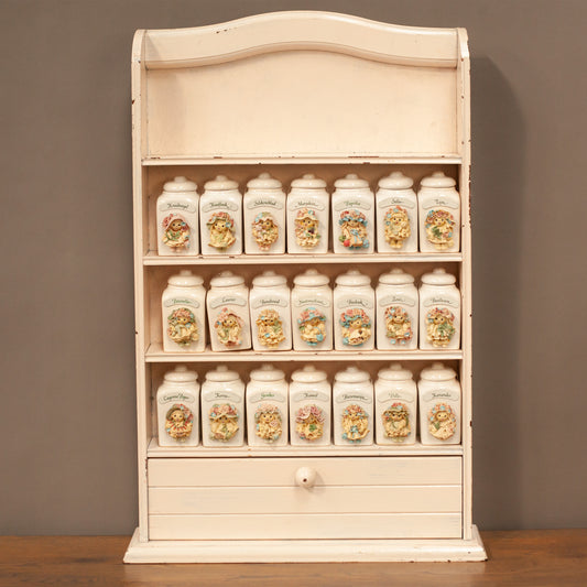 Spice rack with 21 handmade Tjitske van Nus ceramic jars