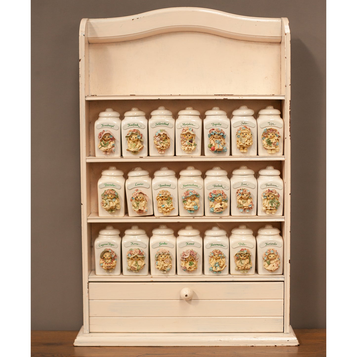 Spice rack with 21 handmade Tjitske van Nus ceramic jars