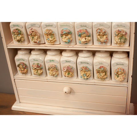 Spice rack with 21 handmade Tjitske van Nus ceramic jars
